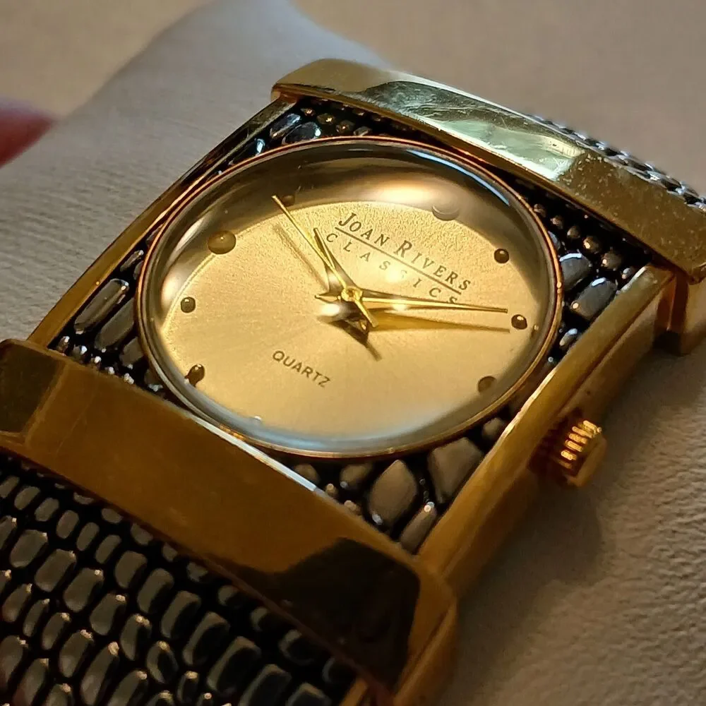 Joan Rivers watch running